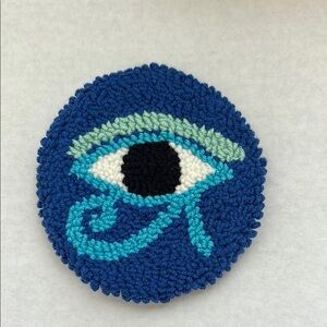 Egyptian eye of Ra themed punch needle coaster handmade